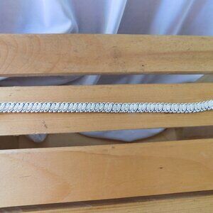 Ladies Silver Tone Natural Diamond Accent Marquise "S" Tennis Bracelet in Brass
